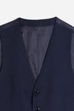 Dettaglio del tessuto punto Milano del gilet blu