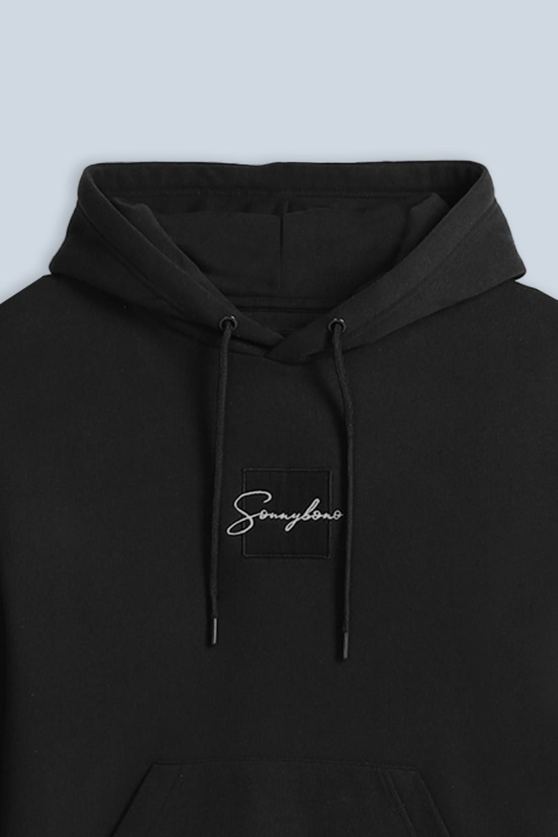 FELPA CON CAPPUCCIO E PATCH COMFORT FIT NERO - Sonnybono