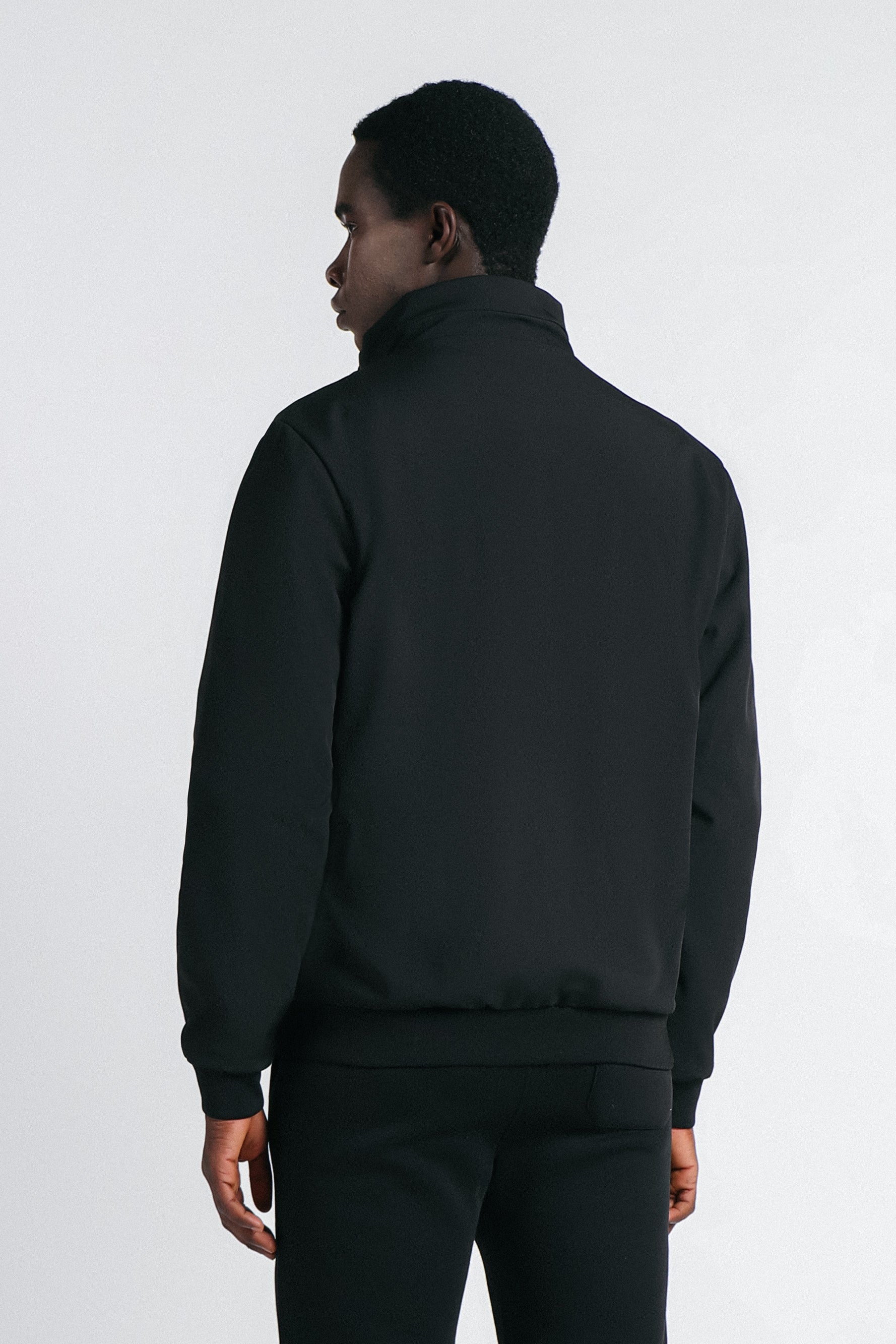 GIUBBOTTO IN SOFTSHELL NERO