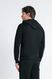 MAGLIA CON ZIP E CAPPUCCIO IN PUNTO MILANO NERO - Sonnybono