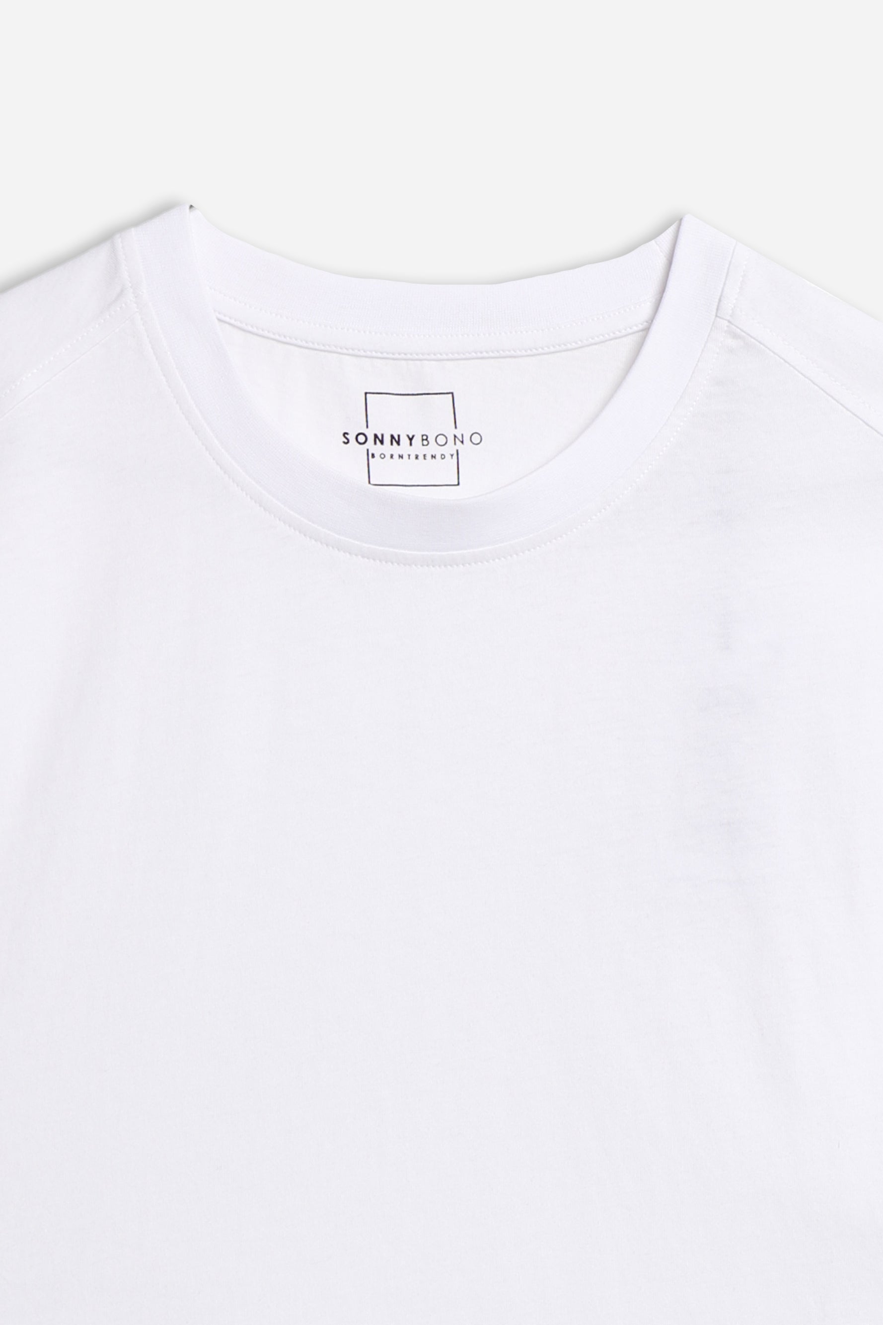 T-SHIRT SMANICATA IN JERSEY BIANCO