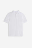 POLO PIQUET BASIC TINTA UNITA E LOGO BIANCO