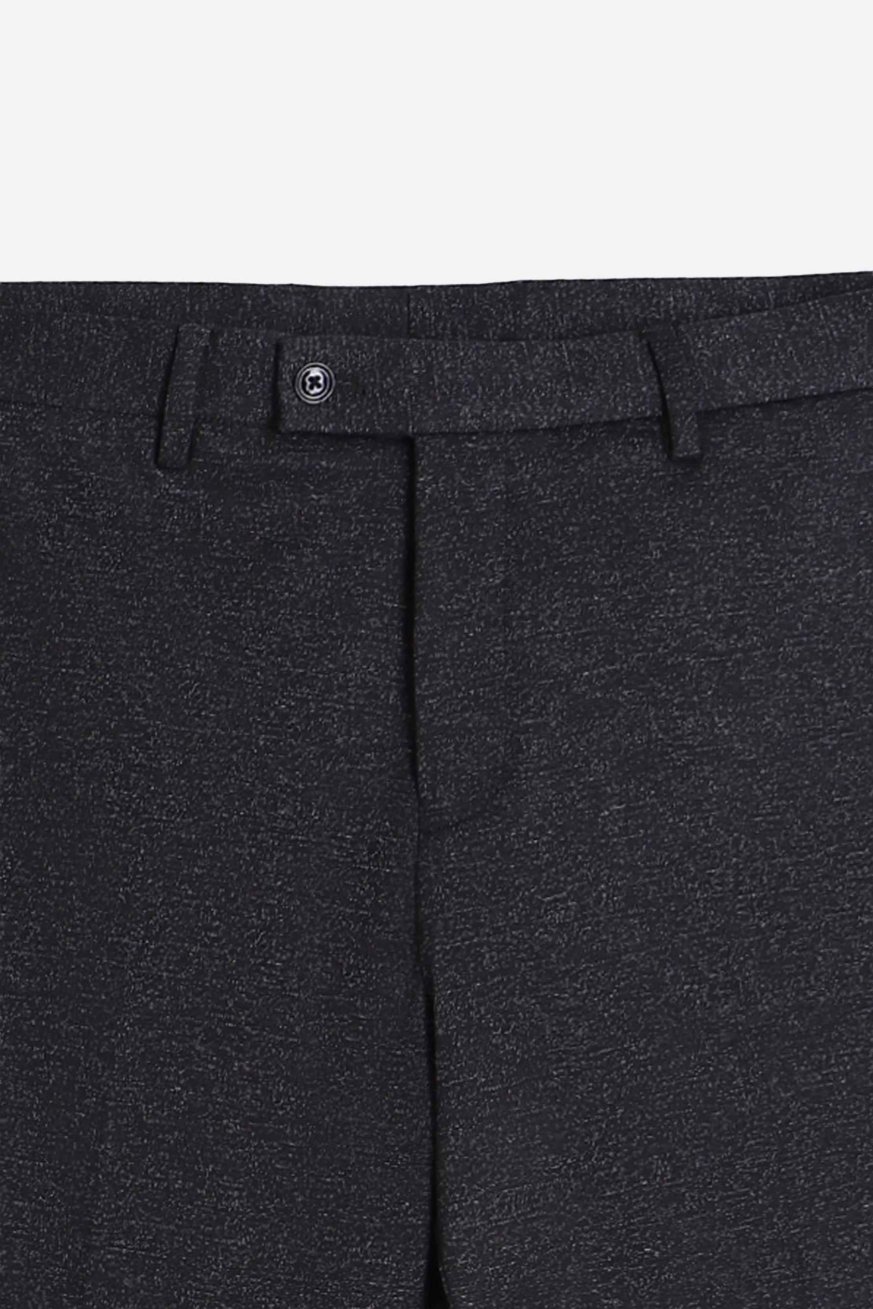 Dettaglio del tessuto punto Milano dei pantaloni neri