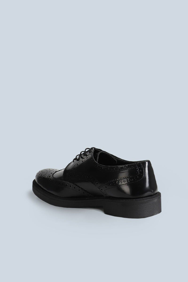 SCARPA STRINGATA FRANCESINA CON CODA DI RONDINE NERO - Sonnybono