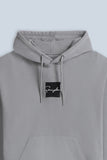 FELPA CON CAPPUCCIO E PATCH COMFORT FIT GRIGIO - Sonnybono